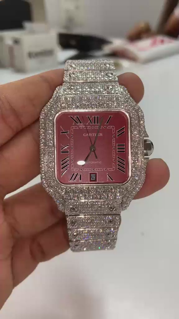 Cartier bust down watch with a red dial.